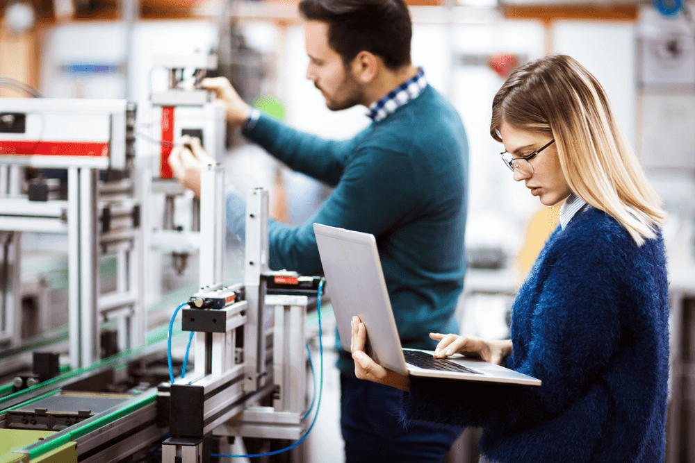 Women figuring out automation integration with laptop